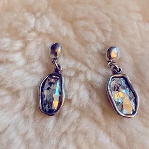 I’ve blue Swarovski Crystal earrings. Beautiful unique setting